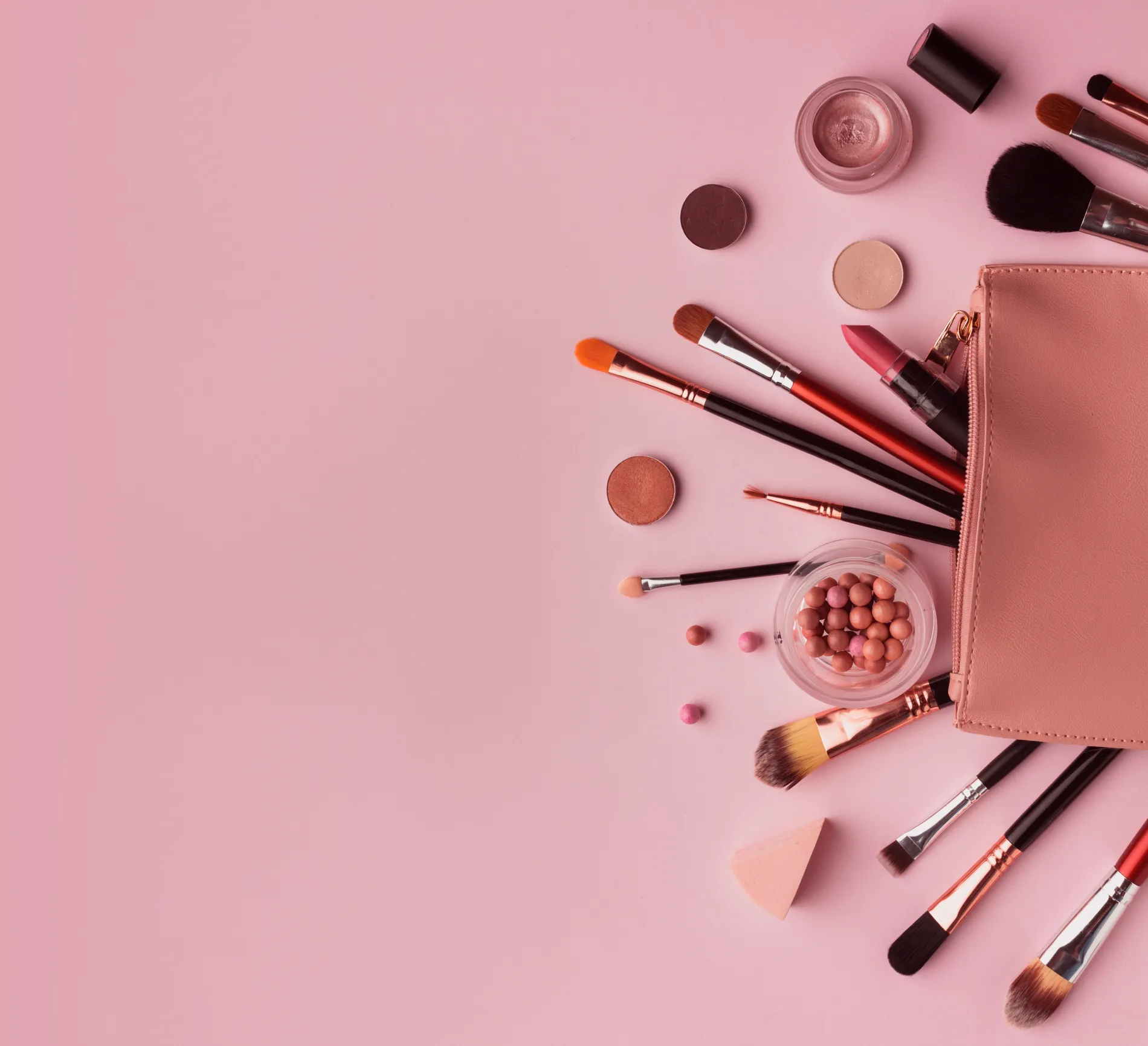 Cosmetics on pink background